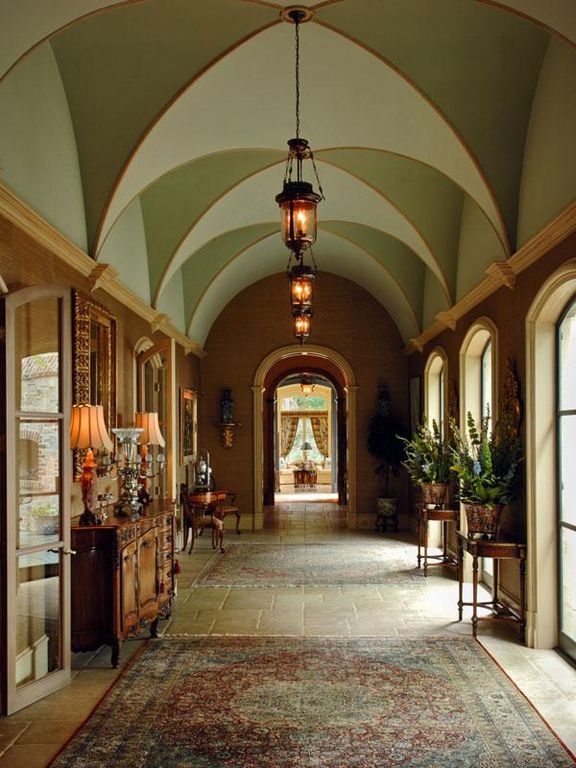 Traditional house hallway with vaulted ceiling