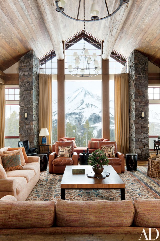 rustic living room with gray velvet sofa