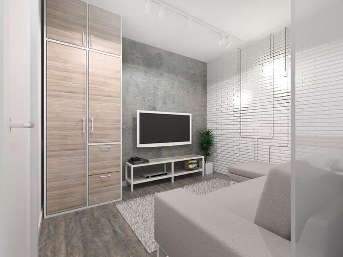 Белая кирпичная стена в дизайне однокомнатной квартиры